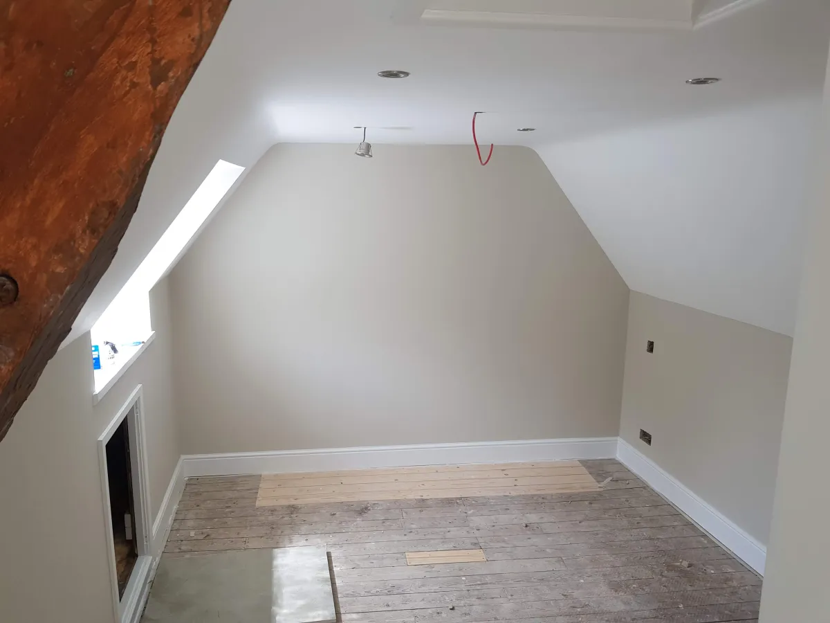 Freshly painted cream loft room by RGM Paint & Decorating